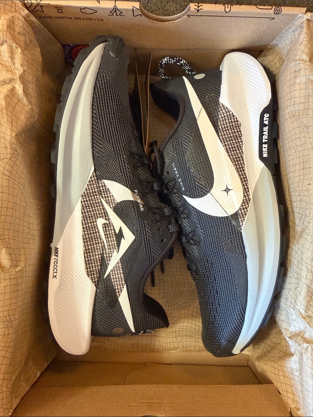 Nike Men’s Black and White Pegasus Trail 5 Running Shoes